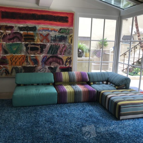 Colorful family room design for an artist's residence